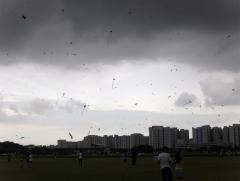 Evening skies with dark clouds looming over Sengkang Field.. 