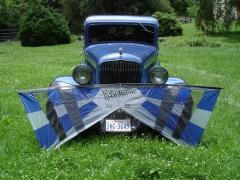 Plymouth PD two door sedan street rod in the front yard